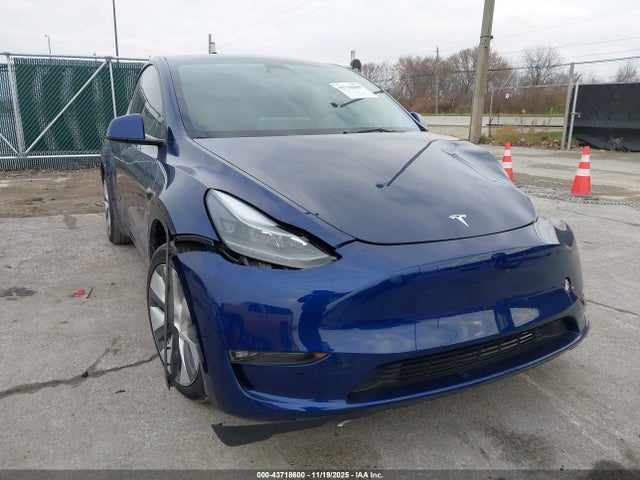 2023 TESLA MODEL Y 7SAYGAEE1PF909534 Photo 0