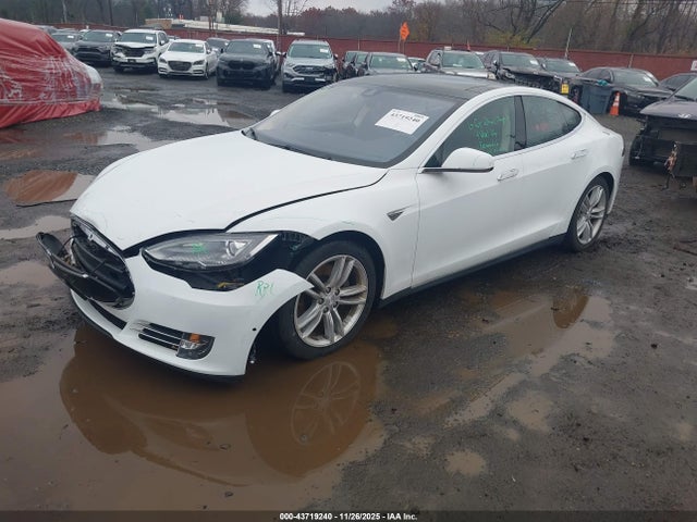 2015 TESLA MODEL S 5YJSA1H21FFP77850 Photo 1