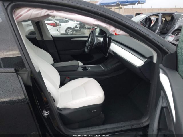 2023 TESLA MODEL Y 7SAYGDEF4PF847654 Photo 4