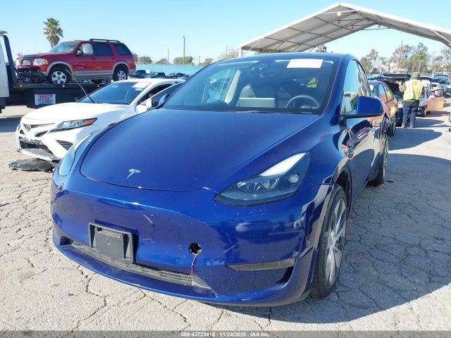 2024 TESLA MODEL Y 7SAYGAEE8RF009832 Photo 1