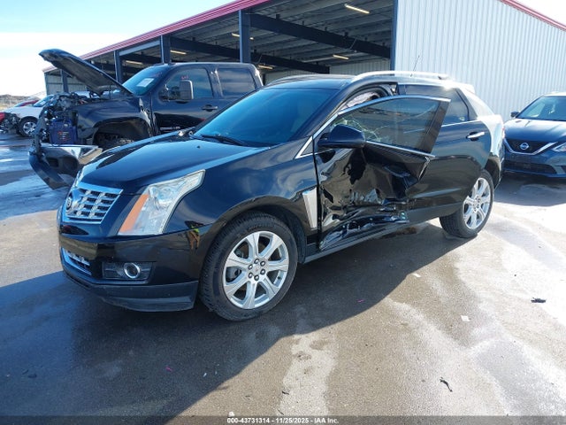 2015 CADILLAC SRX 3GYFNCE38FS583803 Photo 1