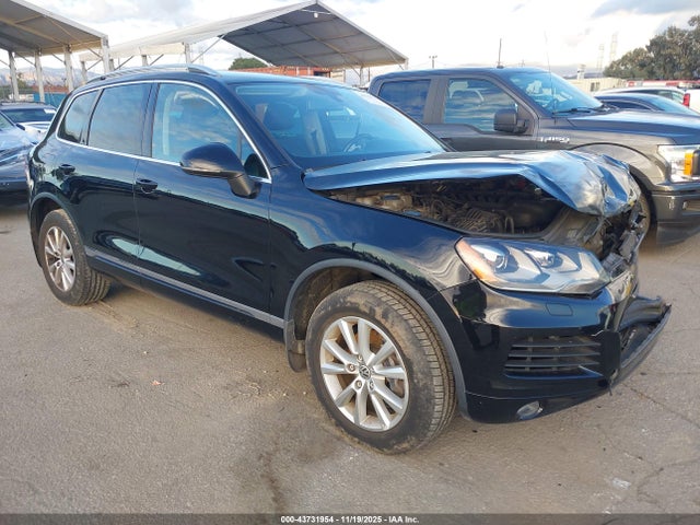 2014 VOLKSWAGEN TOUAREG WVGEF9BP2ED002282
