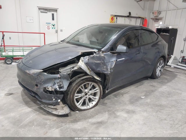 2023 TESLA MODEL Y 7SAYGDEE6PF701893 Photo 1