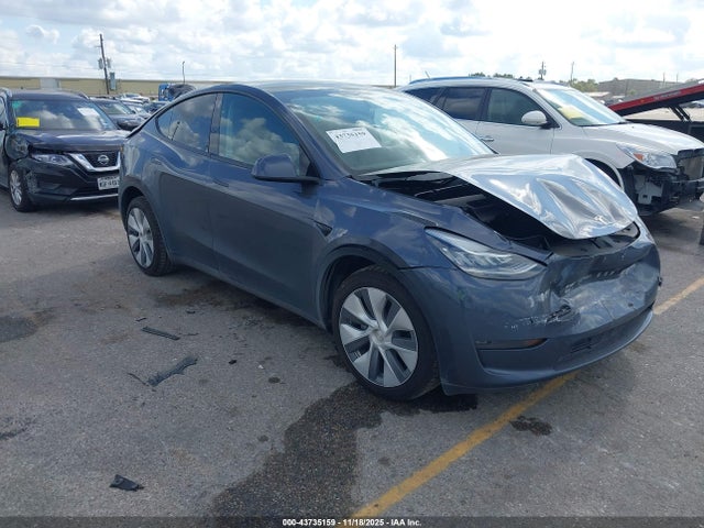 2023 TESLA MODEL Y 7SAYGDEE2PA058049 Photo 0
