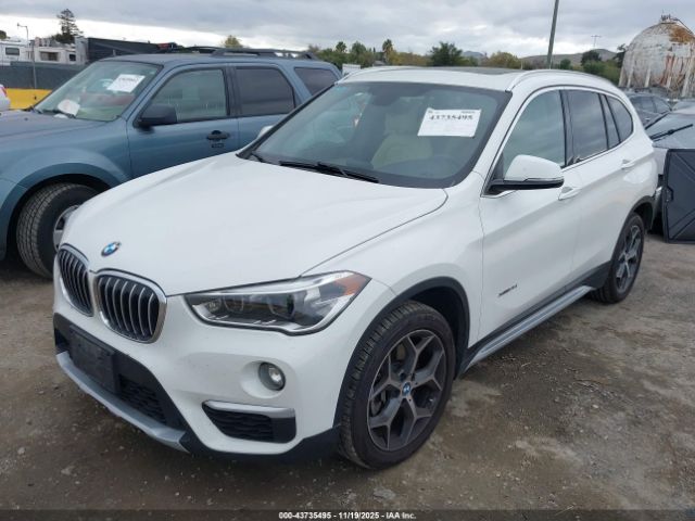 2016 BMW X1 WBXHT3C30GP884866 Photo 1