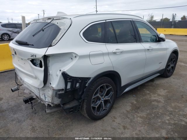 2016 BMW X1 WBXHT3C30GP884866 Photo 3