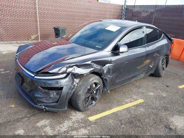 2026 TESLA MODEL Y 7SAYGDED2TF385362 Photo 1
