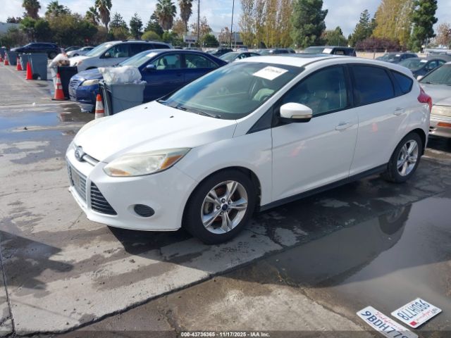 2014 FORD FOCUS 1FADP3K24EL260748 Photo 1