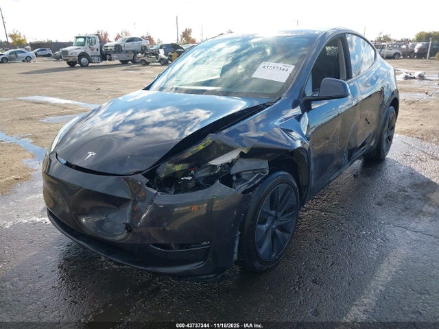 2024 TESLA MODEL Y 7SAYGDEE7RF112936 Photo 1