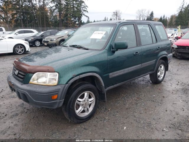 1999 HONDA CR-V JHLRD1861XC080320 Photo 1