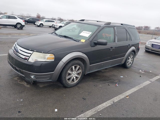 2008 FORD TAURUS X 1FMDK05W58GA04214 Photo 1