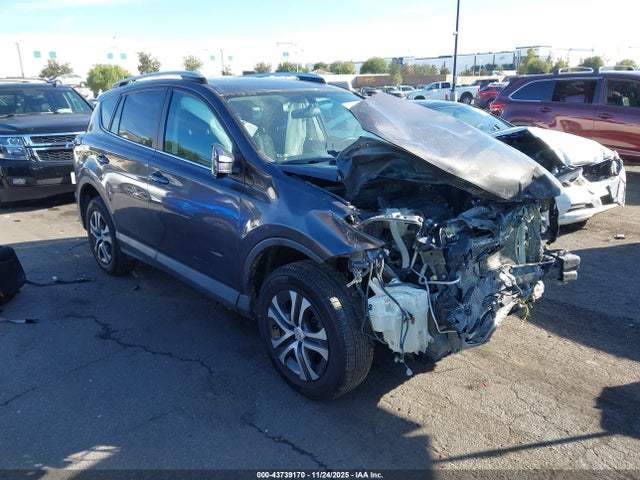 2T3ZFREV3GW276712 Toyota RAV4 LE