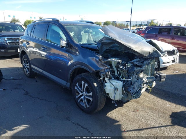 2T3ZFREV3GW276712 Toyota RAV4 LE