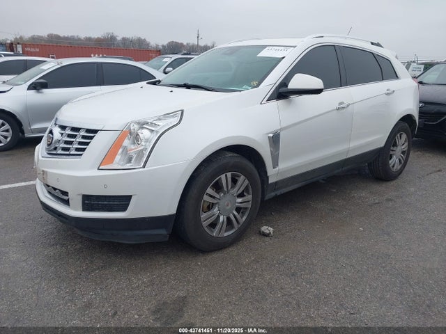 2015 CADILLAC SRX 3GYFNBE38FS582175 Photo 1