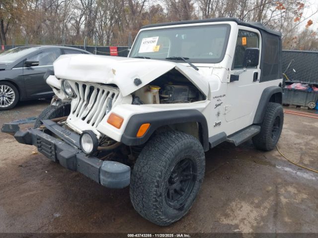 1999 JEEP WRANGLER 1J4FY19S8XP409324 Photo 1