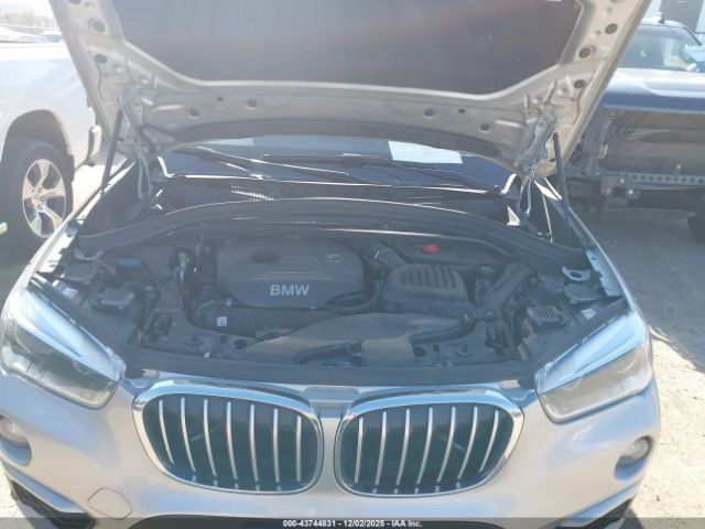 2017 BMW X1 WBXHT3C3XH5F69475 Photo 9