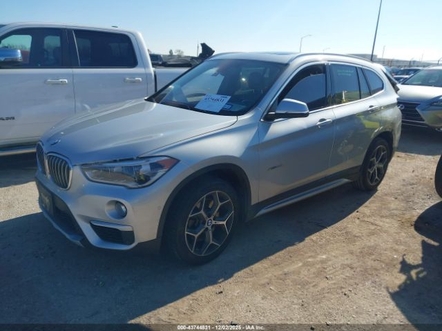2017 BMW X1 WBXHT3C3XH5F69475 Photo 1