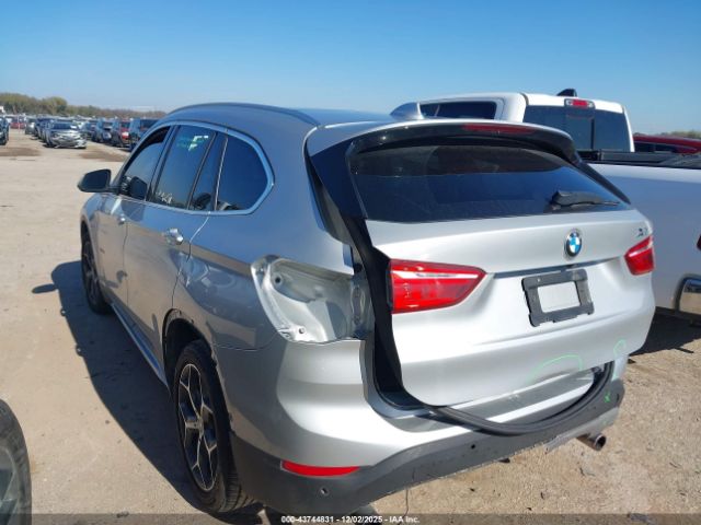 2017 BMW X1 WBXHT3C3XH5F69475 Photo 2