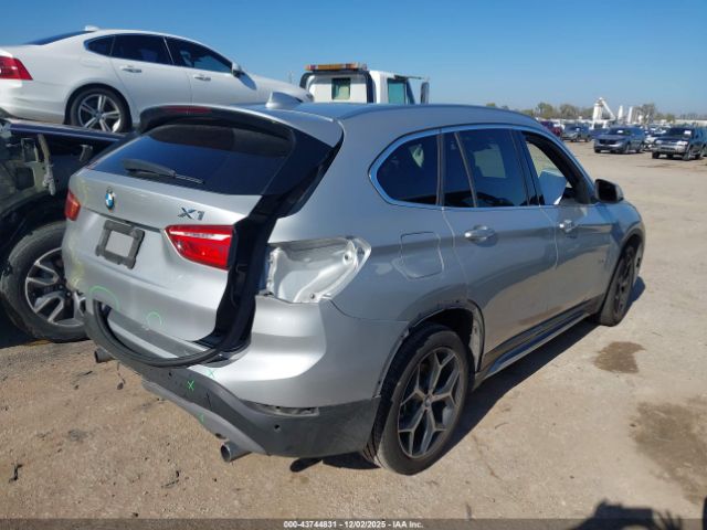 2017 BMW X1 WBXHT3C3XH5F69475 Photo 3