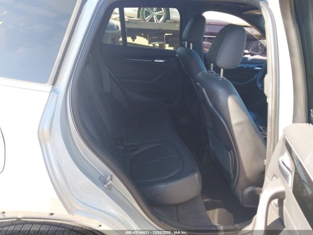 2017 BMW X1 WBXHT3C3XH5F69475 Photo 7