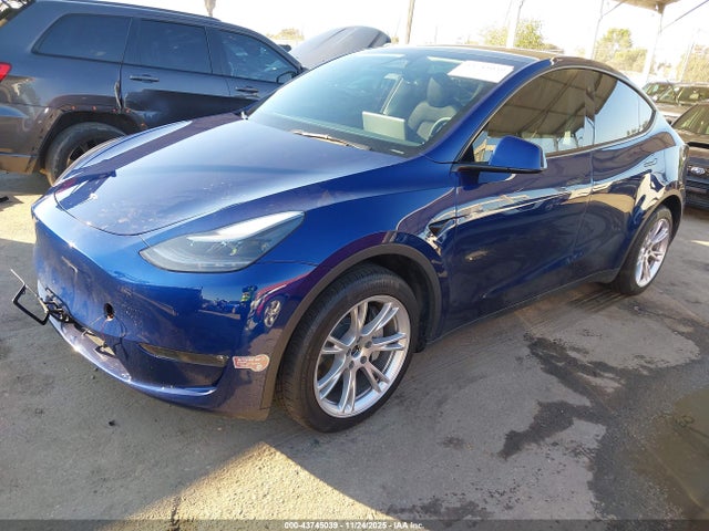 2023 TESLA MODEL Y 7SAYGDEE5PF890004 Photo 1