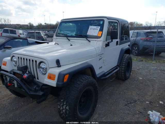 2000 JEEP WRANGLER 1J4FA49S6YP721844 Photo 1