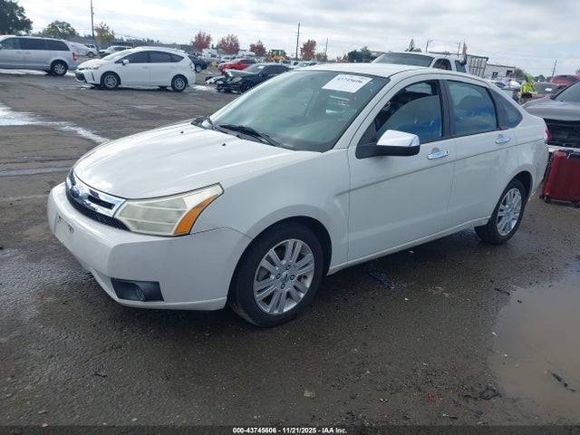 2010 FORD FOCUS 1FAHP3HN9AW174895 Photo 1