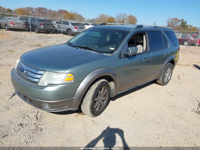 2008 FORD TAURUS X 1FMDK02W38GA27818 Photo 1