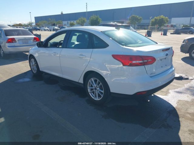 2015 FORD FOCUS 1FADP3F21FL206982 Photo 2