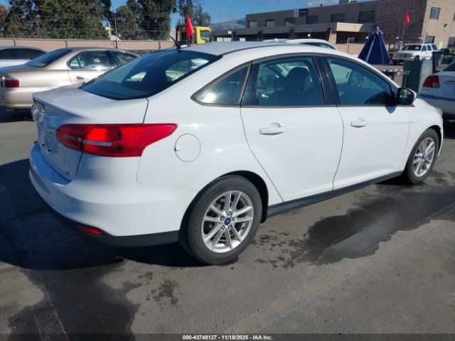 2015 FORD FOCUS 1FADP3F21FL206982 Photo 3
