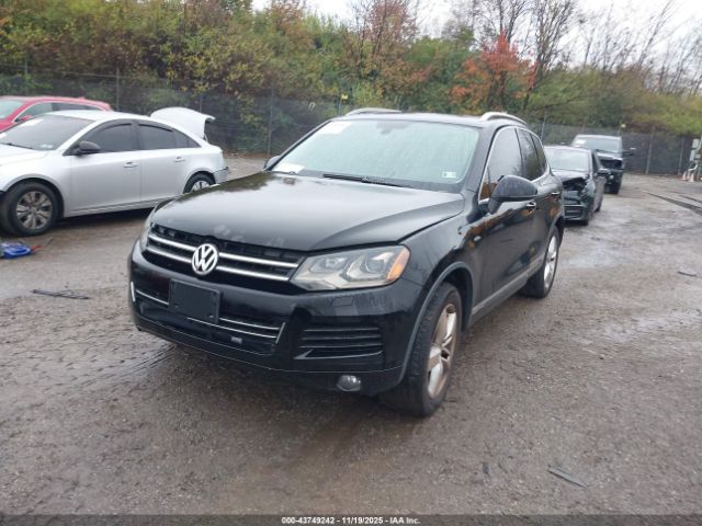 2011 VOLKSWAGEN TOUAREG WVGFK9BPXBD005944 Photo 1