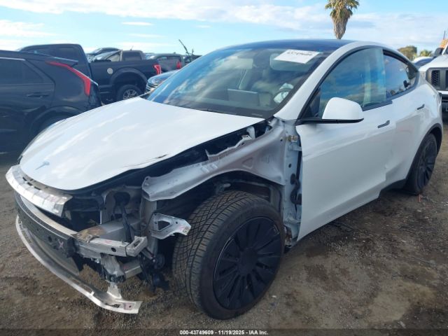 2022 TESLA MODEL Y 7SAYGAEE4NF574637 Photo 1