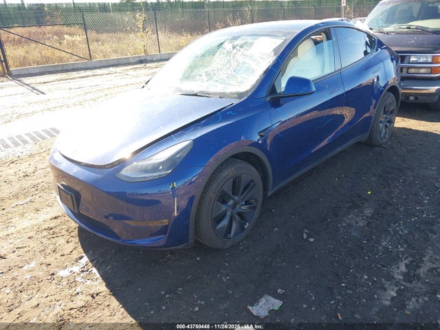 2024 TESLA MODEL Y 7SAYGDEE7RF171033 Photo 1