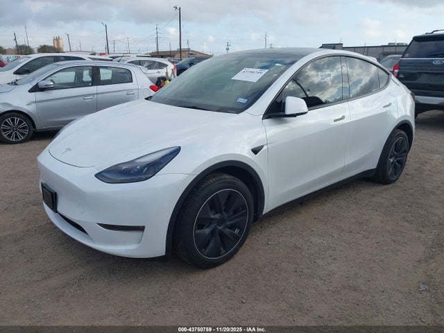 2024 TESLA MODEL Y 7SAYGDEE7RA280301 Photo 1