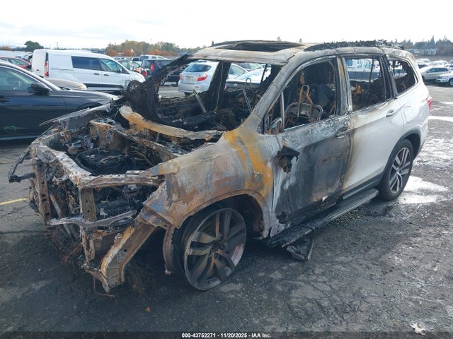 5FNYF6H04HB052060 Honda Pilot Elite