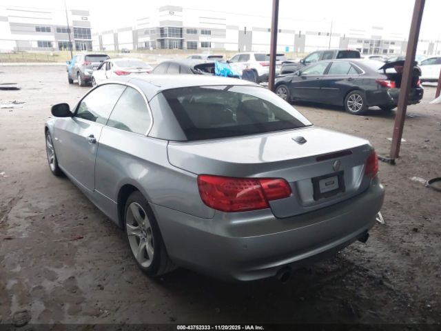 2011 BMW 335I WBADX7C59BE743031 Photo 2