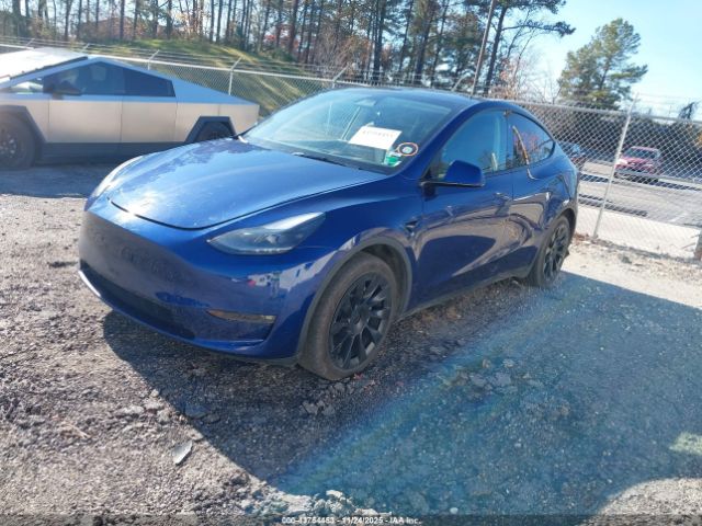 2023 TESLA MODEL Y 7SAYGAEE0PF970731 Photo 1