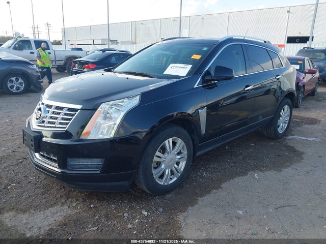 2014 CADILLAC SRX 3GYFNBE38ES657567 Photo 1