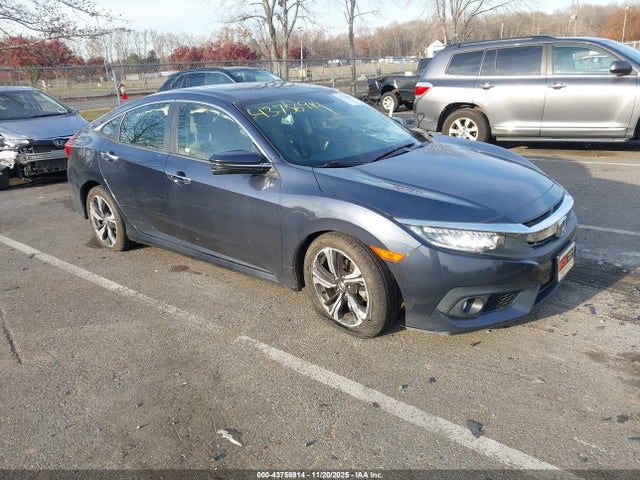 Продаж на аукціоні авто 2018 Honda Civic Touring, vin: JHMFC1F94JX030428, номер лоту: 43756914