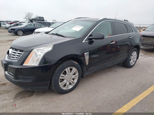 2014 CADILLAC SRX 3GYFNEE39ES687193 Photo 1