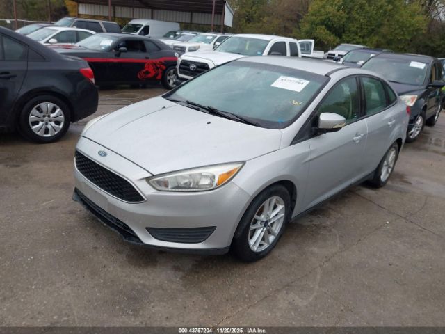 2016 FORD FOCUS 1FADP3F23GL355878 Photo 1