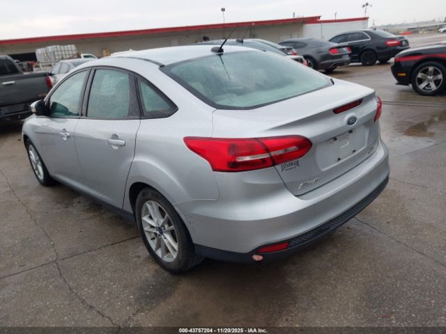 2016 FORD FOCUS 1FADP3F23GL355878 Photo 2