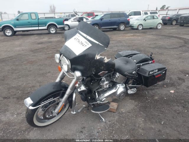 2011 HARLEY-DAVIDSON FLSTC 1HD1BW515BB019703 Photo 1