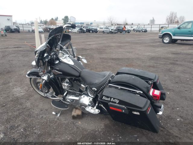 2011 HARLEY-DAVIDSON FLSTC 1HD1BW515BB019703 Photo 2