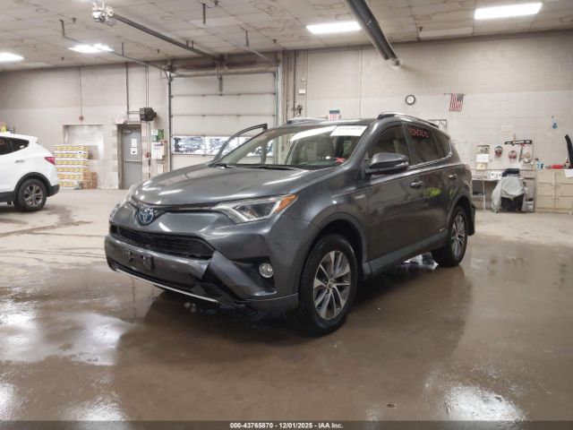 2018 TOYOTA RAV4 HYBRID JTMRJREV8JD245295 Photo 1