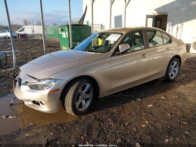2013 BMW 320I WBA3C3C50DF982531 Photo 1
