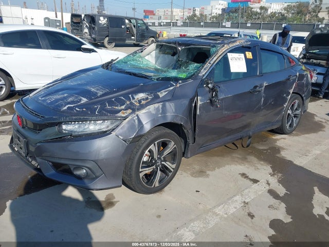 Honda Civic Touring 2016 2HGFC1F98GH651414 Image 2