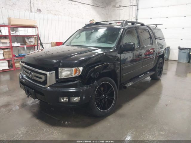 2011 HONDA RIDGELINE 5FPYK1F51BB001997 Photo 1