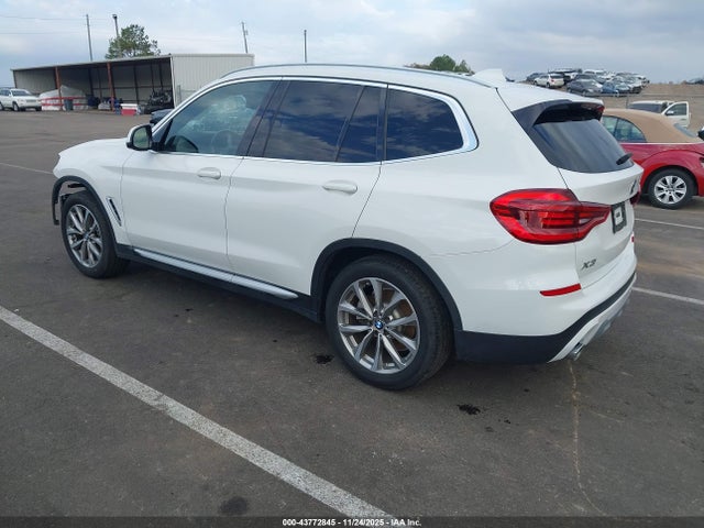2019 BMW X3 5UXTR7C51KLF33190 Photo 2