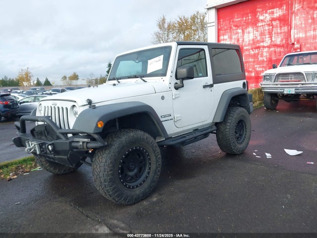 1C4AJWAG5GL196512 Jeep Wrangler Sport